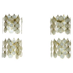 Set of four brass and mother-of-pearl sconces in Verner Panton style. Italy 1970