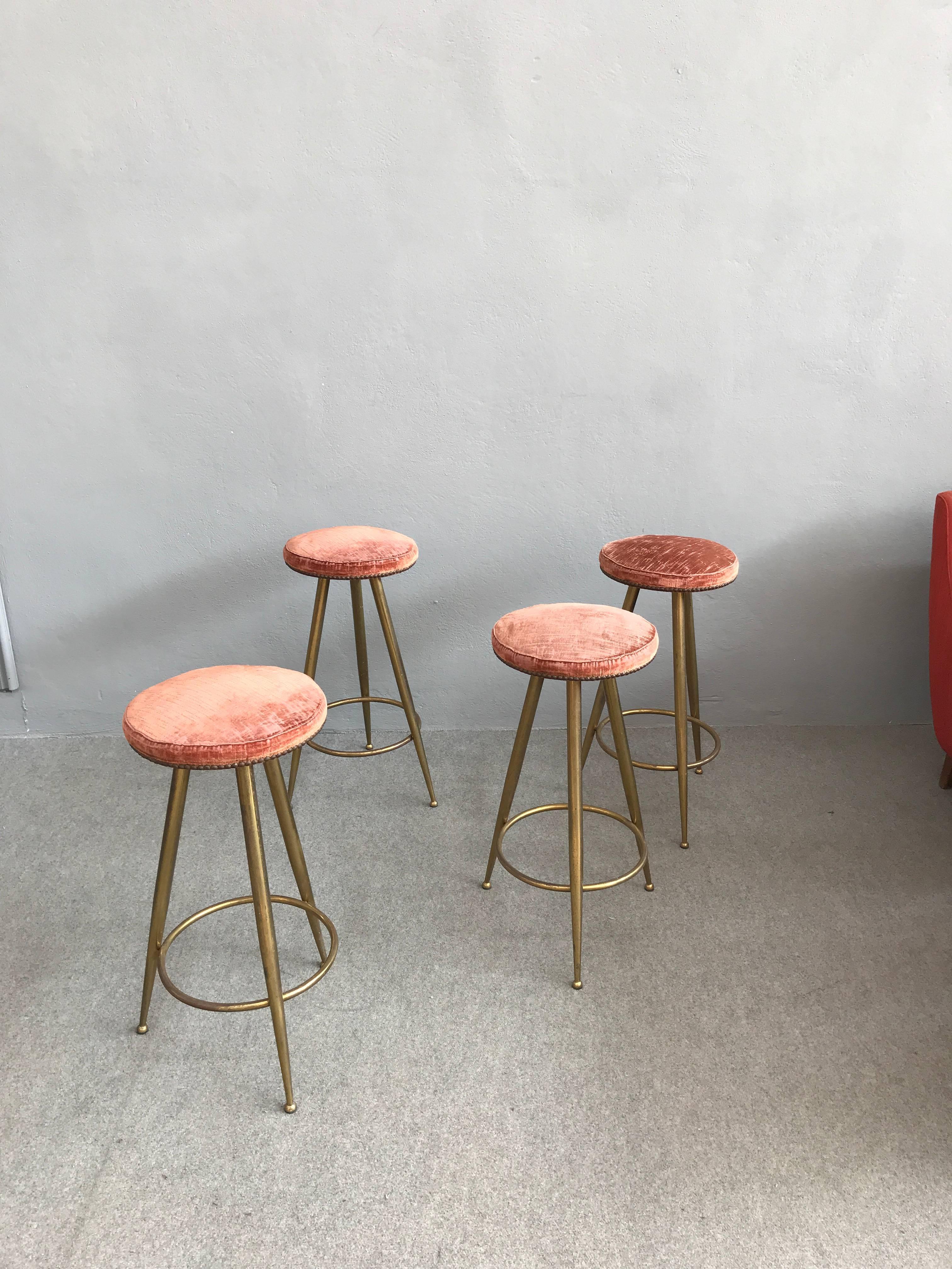 Nice set of four brass stools in the style of Gio Ponti.
Original pink velvet upholstering.