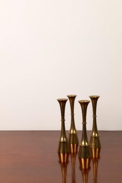 Set of four brass candle sticks, attributed to Jens H. Quistgaard, 1960's