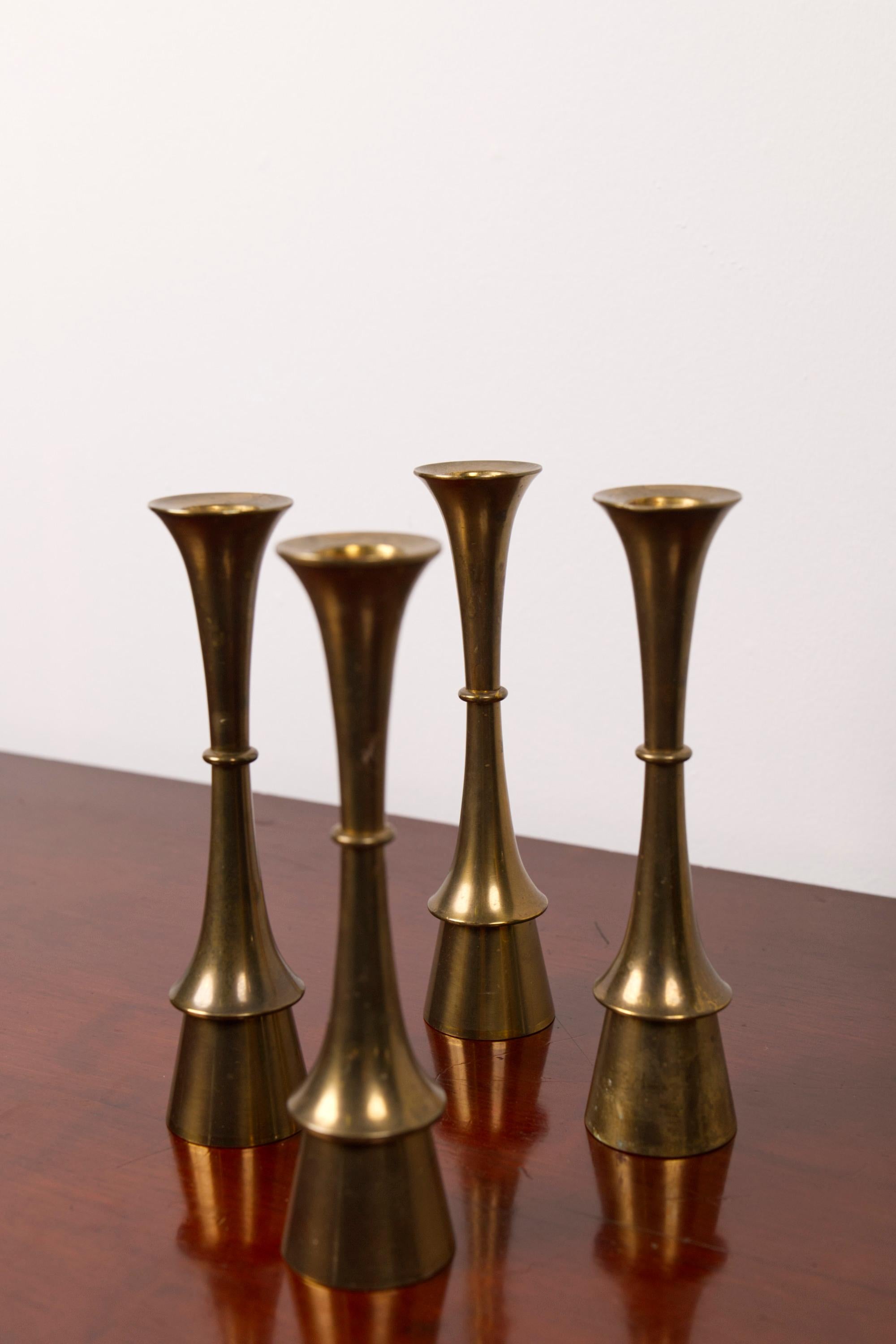 Danois Set of four brass candle sticks, attributed to Jens H. Quistgaard, 1960's en vente