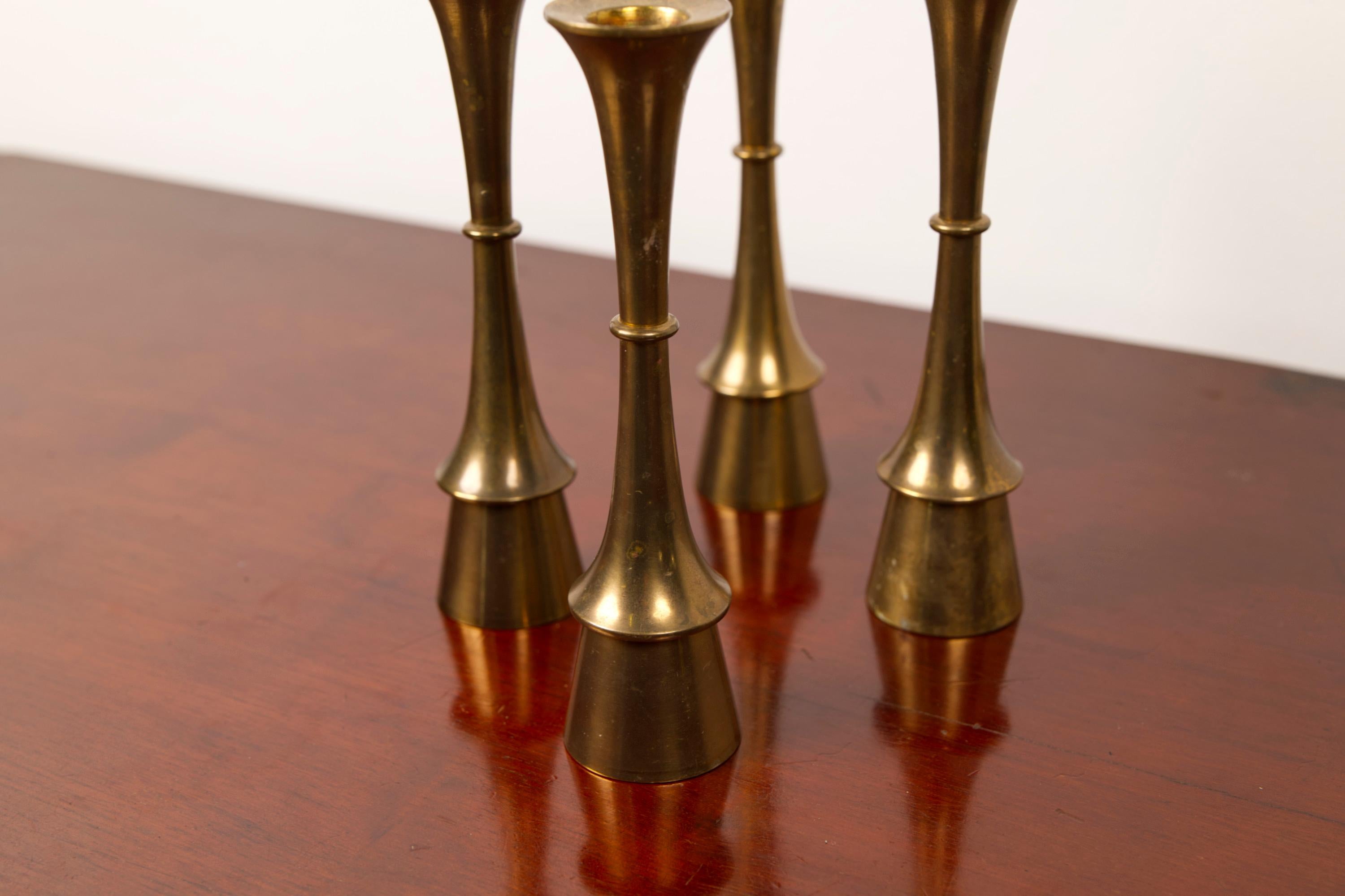 Tourné Set of four brass candle sticks, attributed to Jens H. Quistgaard, 1960's en vente