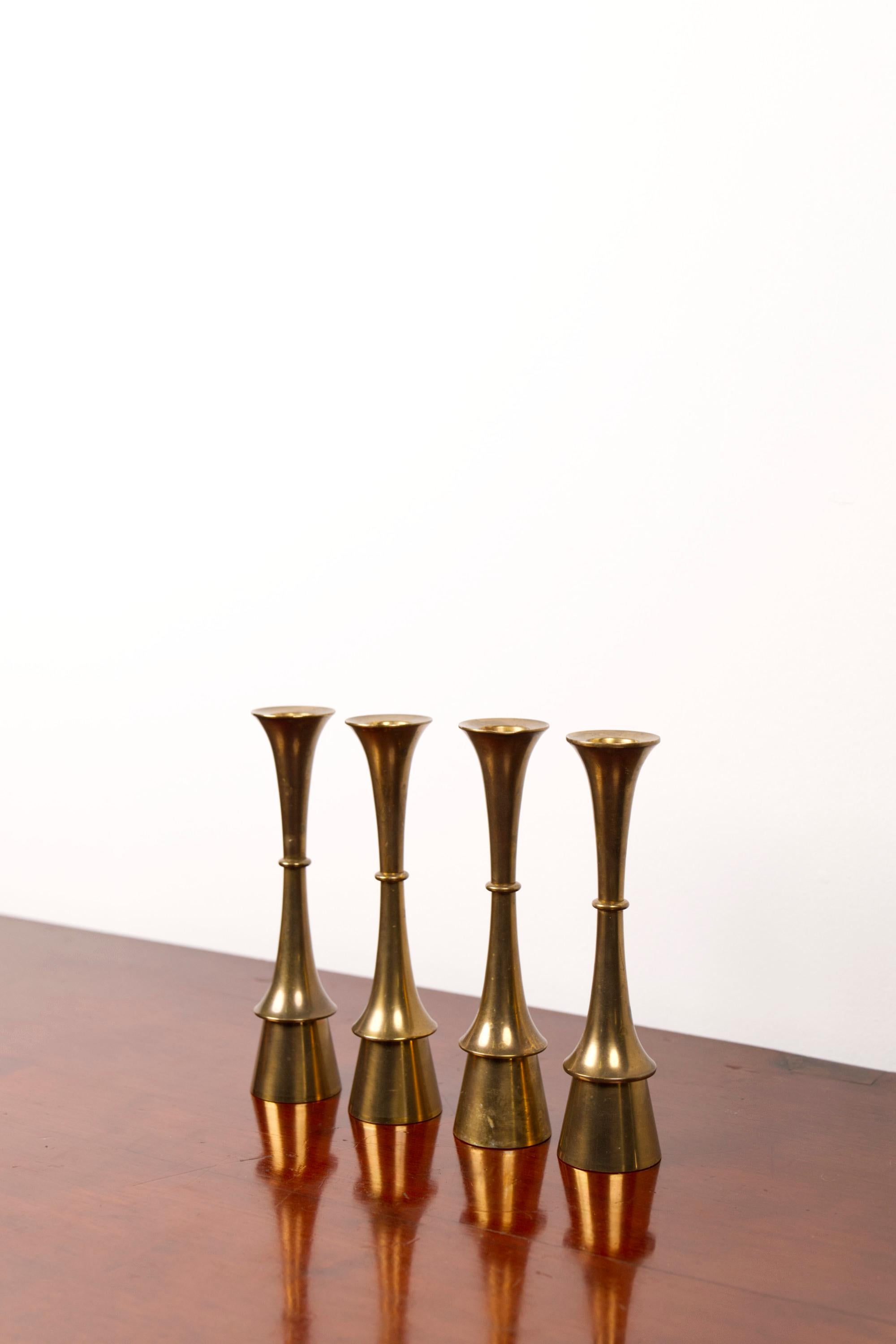 Laiton Set of four brass candle sticks, attributed to Jens H. Quistgaard, 1960's en vente