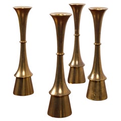 Set of four brass candle sticks, attributed to Jens H. Quistgaard, 1960's