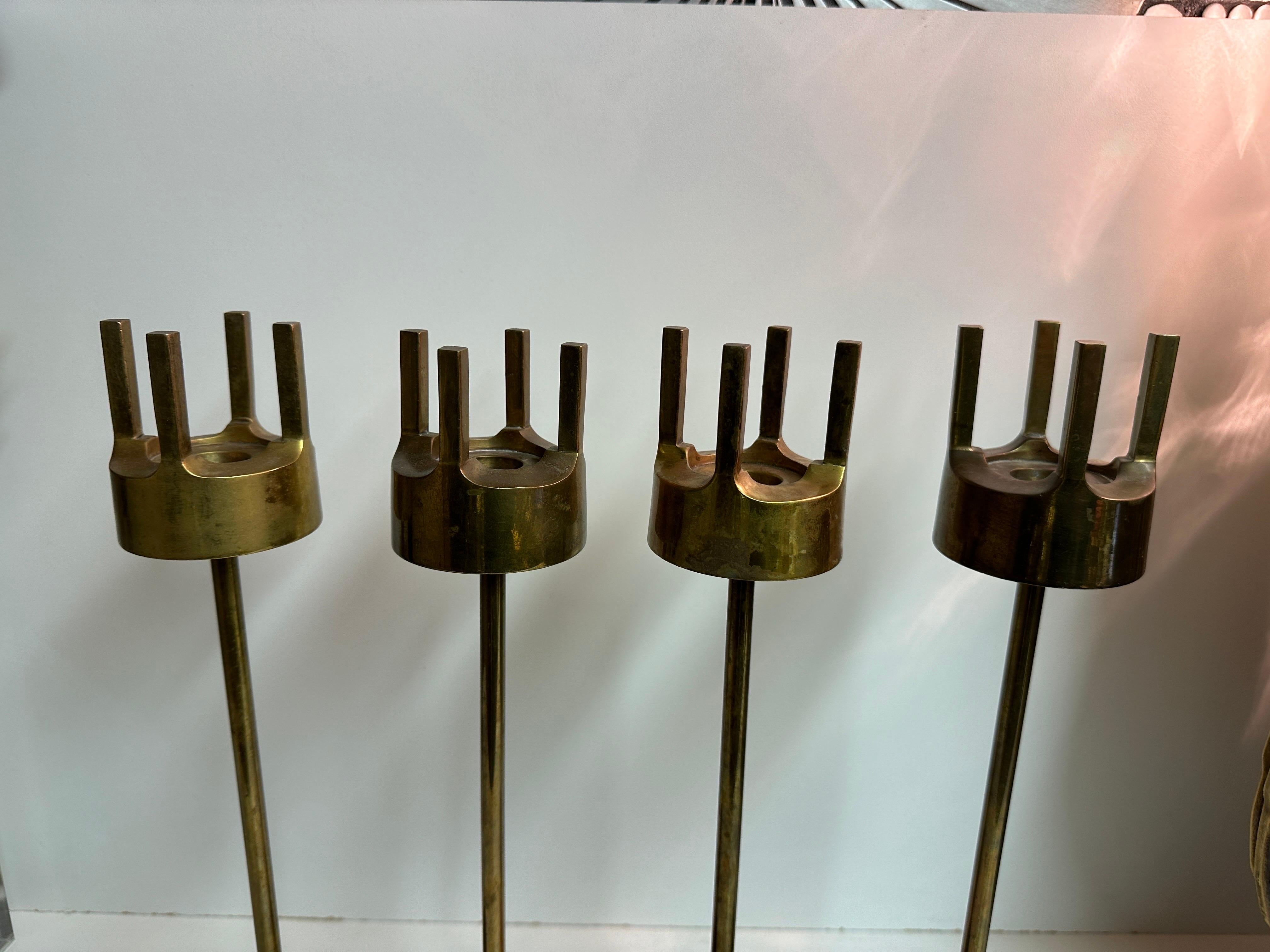 Mid-Century Modern Set of Four Brass Candleholders For Sale
