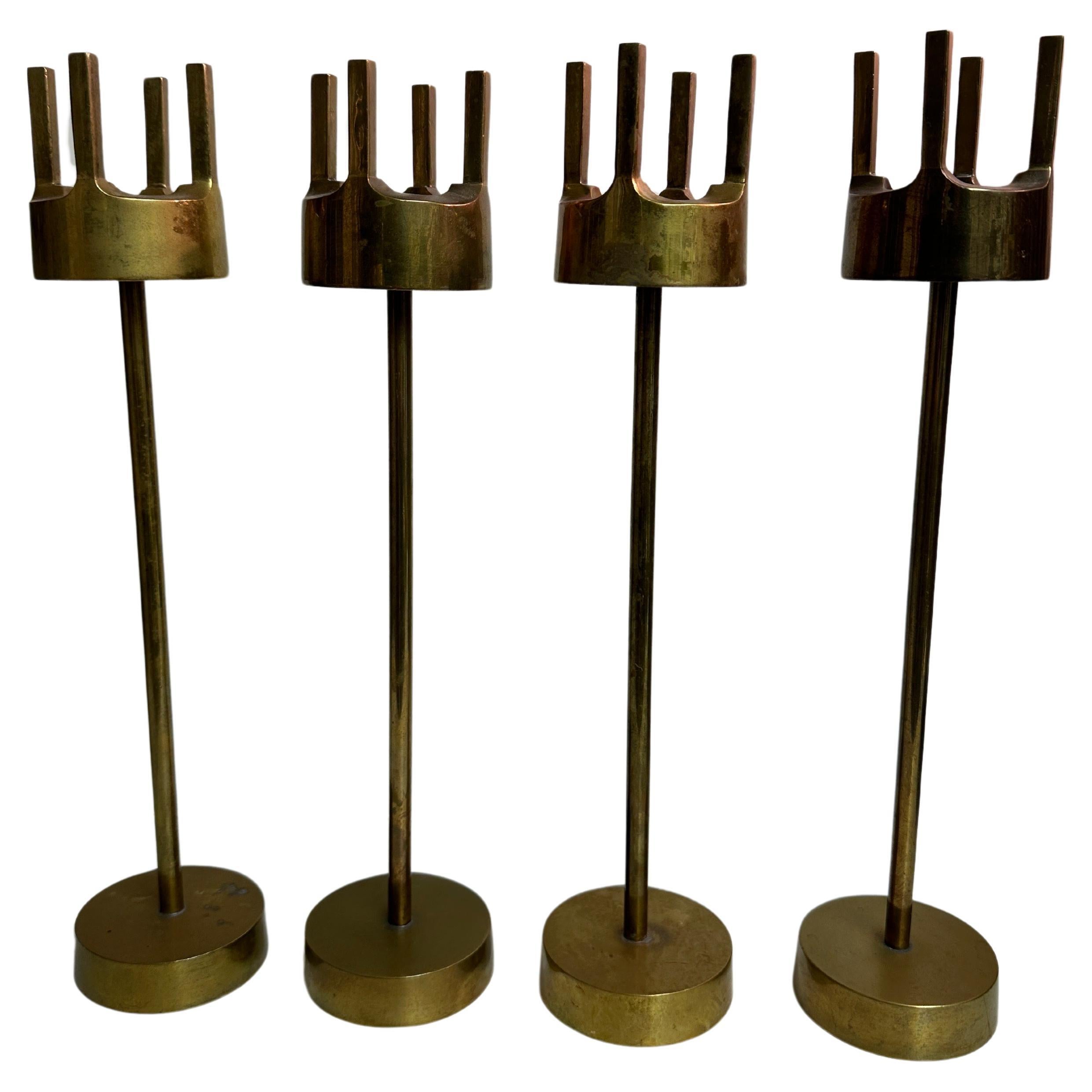 Set of Four Brass Candleholders For Sale