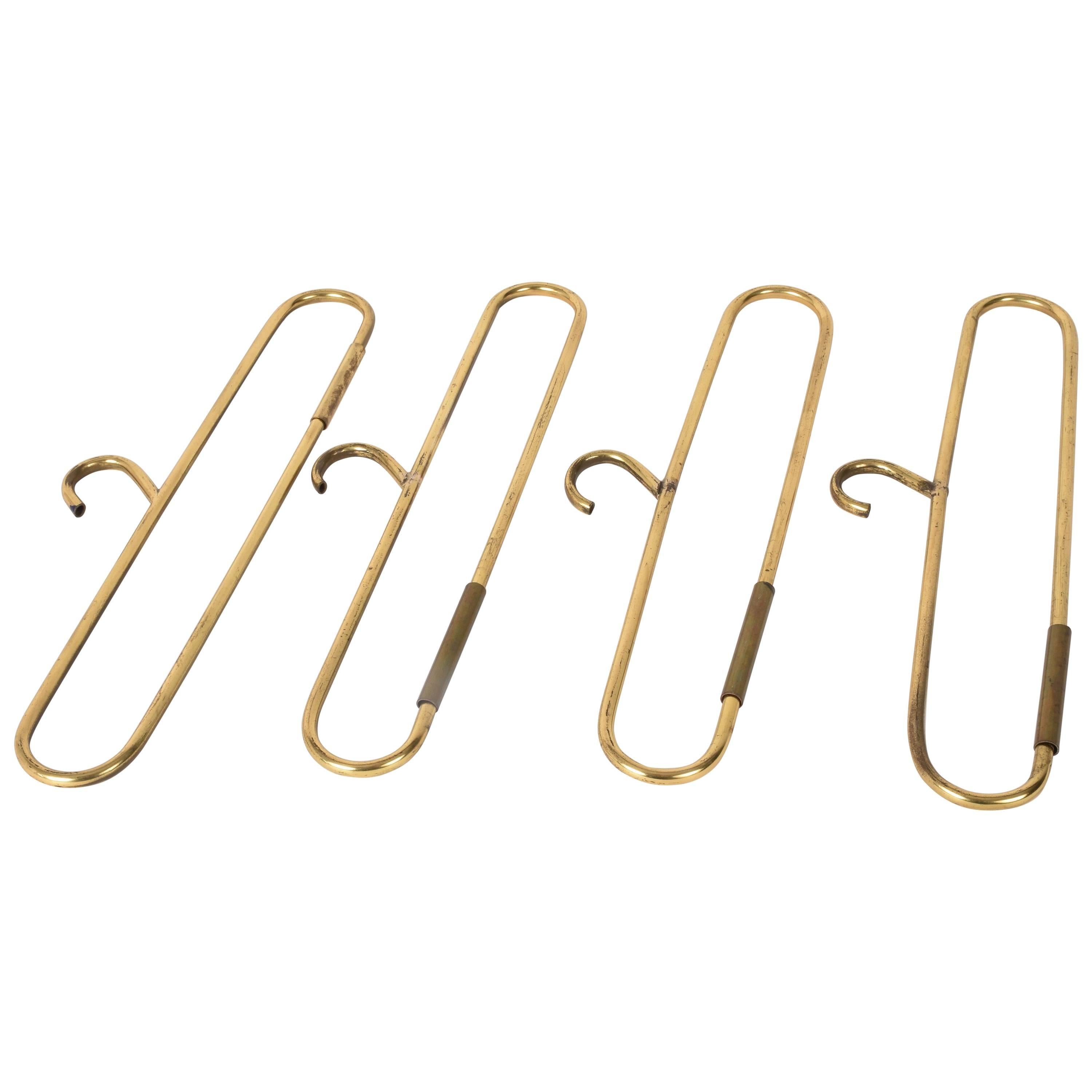 Set of Four Brass Coat Hangers