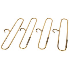 Set of Four Brass Coat Hangers