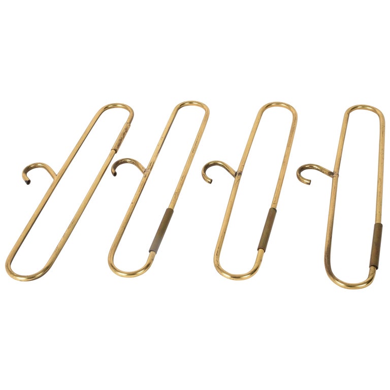 Set of Four Brass Coat Hangers For Sale at 1stDibs