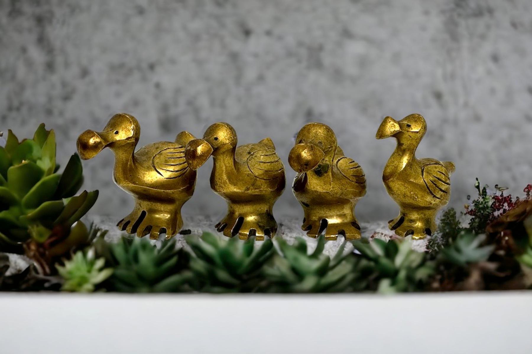 A set of four lovely mysterious dodo bird figurines, flightless and extinct, this sturdy little guys are loaded with character. Made in the 1960s. Found at an estate sale in Nuremberg, Germany. They are not marked. A nice addition to your