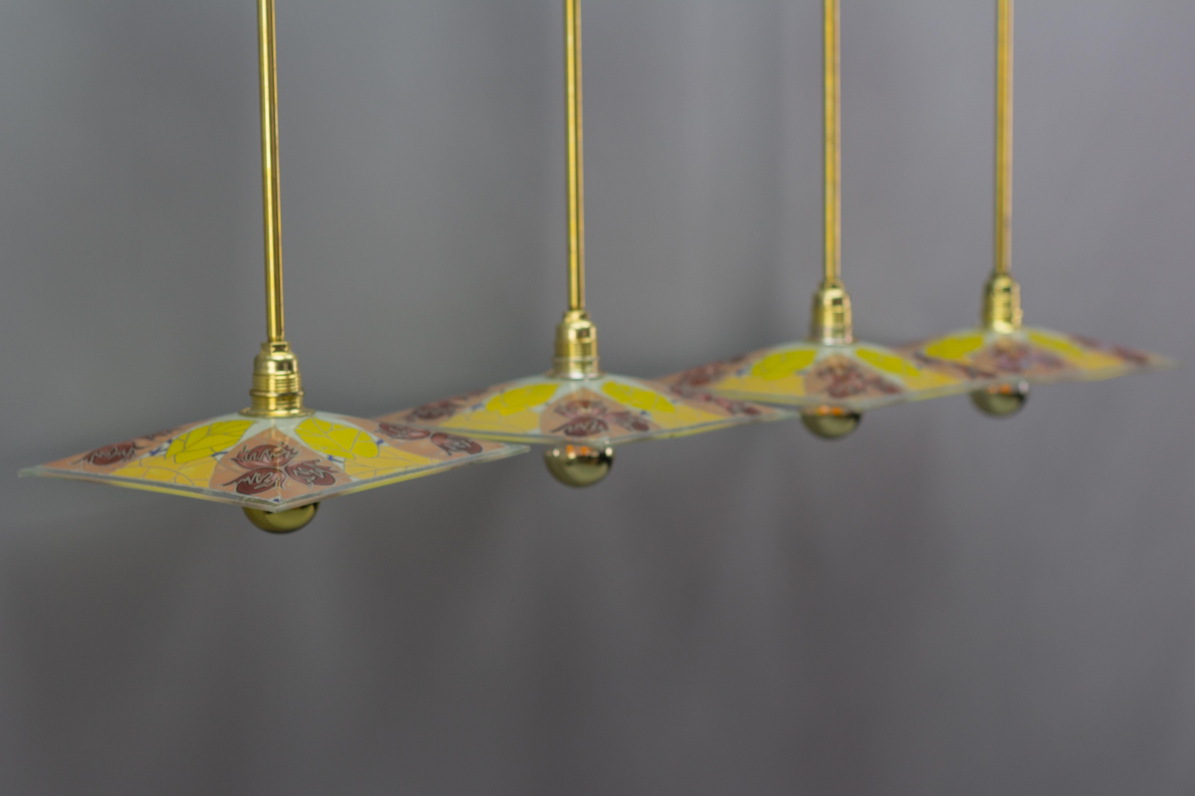 Enameled Set of Four Brass Pendant Lights with Enamelled Glass by Loys Lucha For Sale