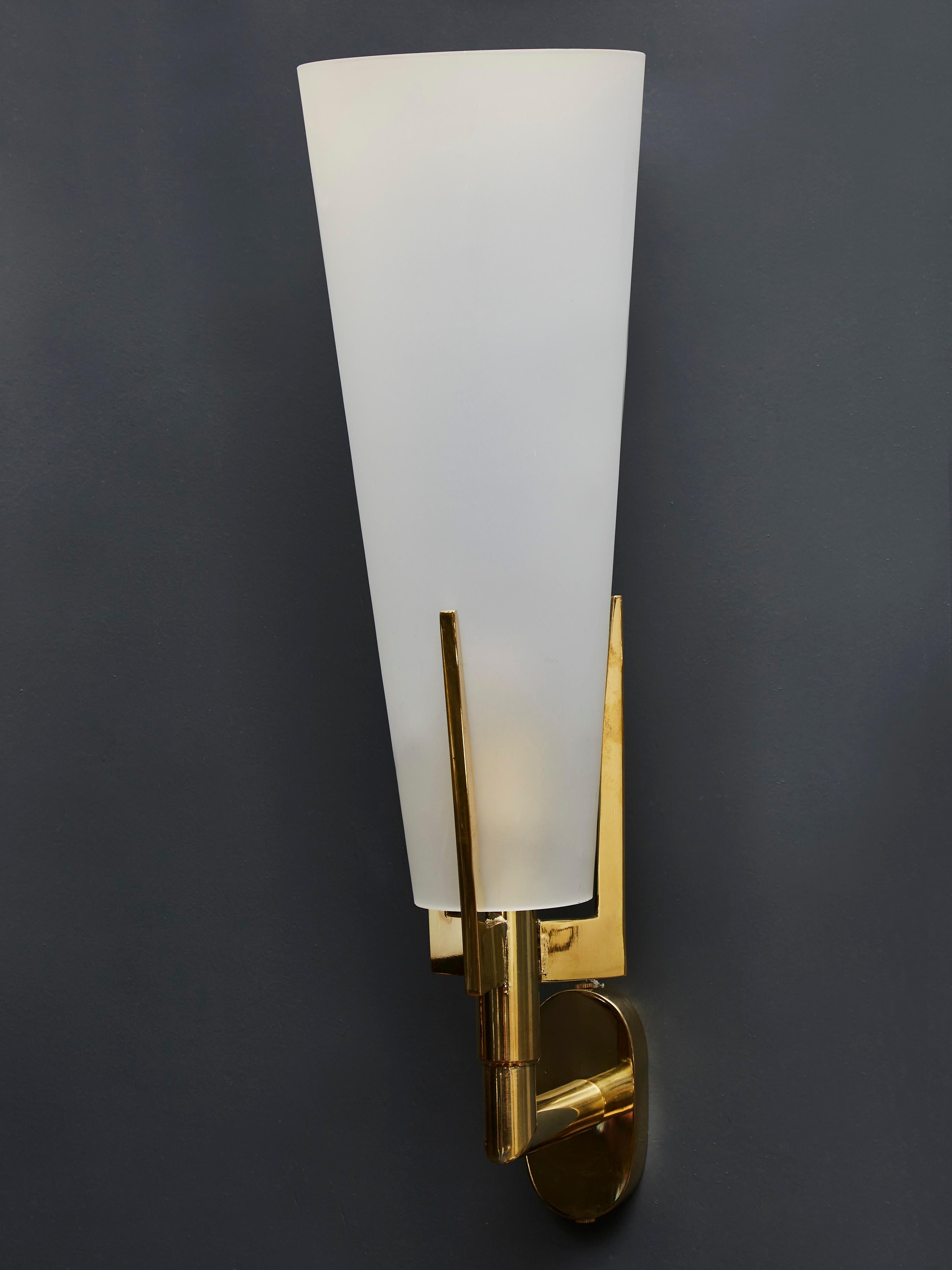 Mid-Century Modern Set of Four Brass Wall Sconces with Tall Frosted Glass Cones For Sale