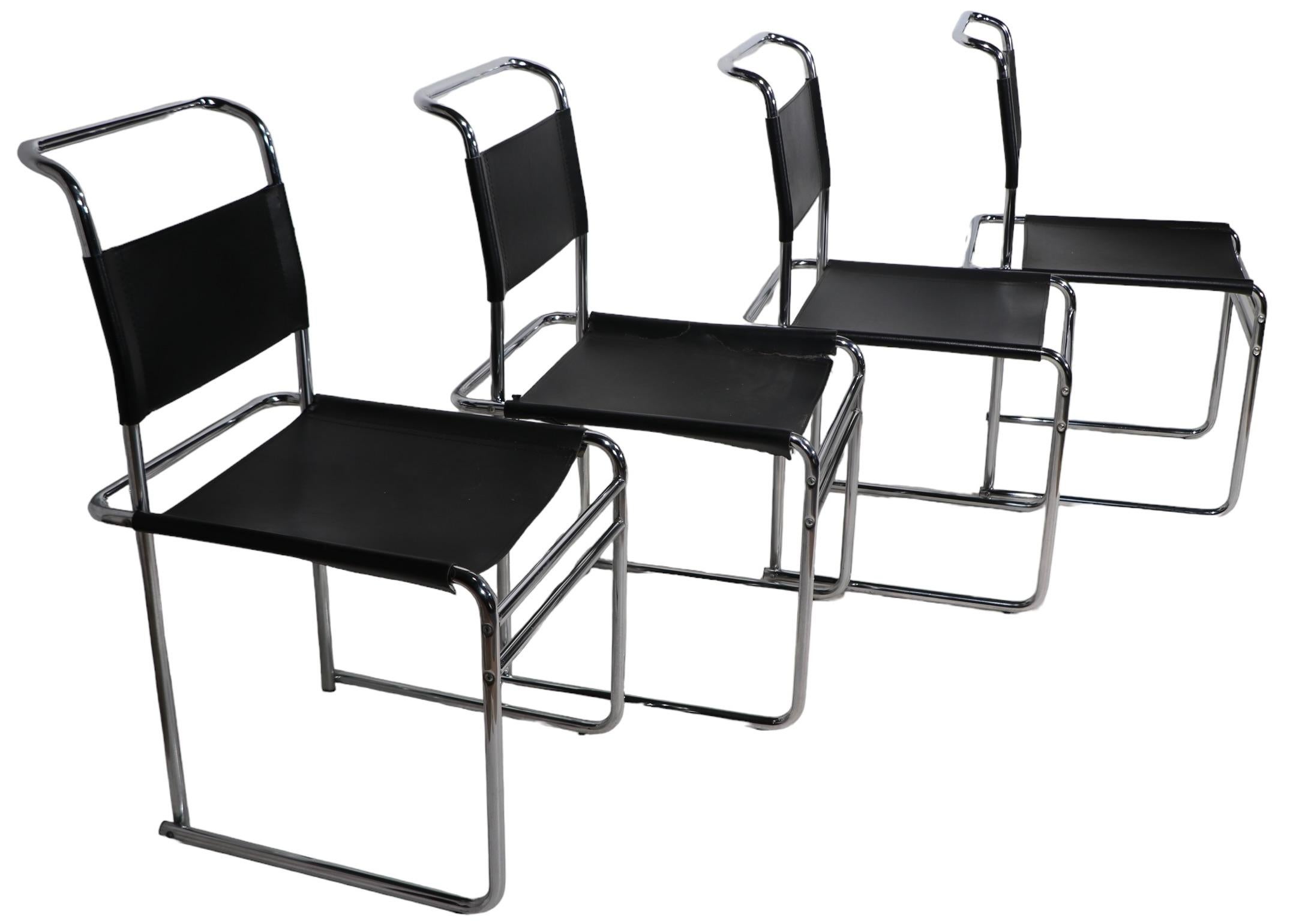 Exceptional set of B-5 tubular chrome  and leather dining chairs. The chairs were originally designed by Modernist Pioneer and legendary figure, Marcel Breuer, during his tenure at the Bauhaus. These particular examples were made in Italy, circa