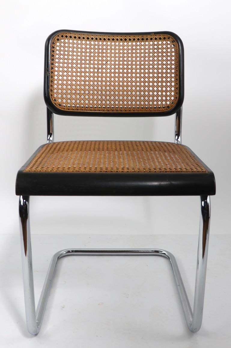 Nice set of Cesca style chairs by Breuer, circa 1970s probably Italian made. The bright tubular chrome frames support a caned seat and back rest, having black frames. Two seats have been professionally re-caned, some chairs have an old decal on