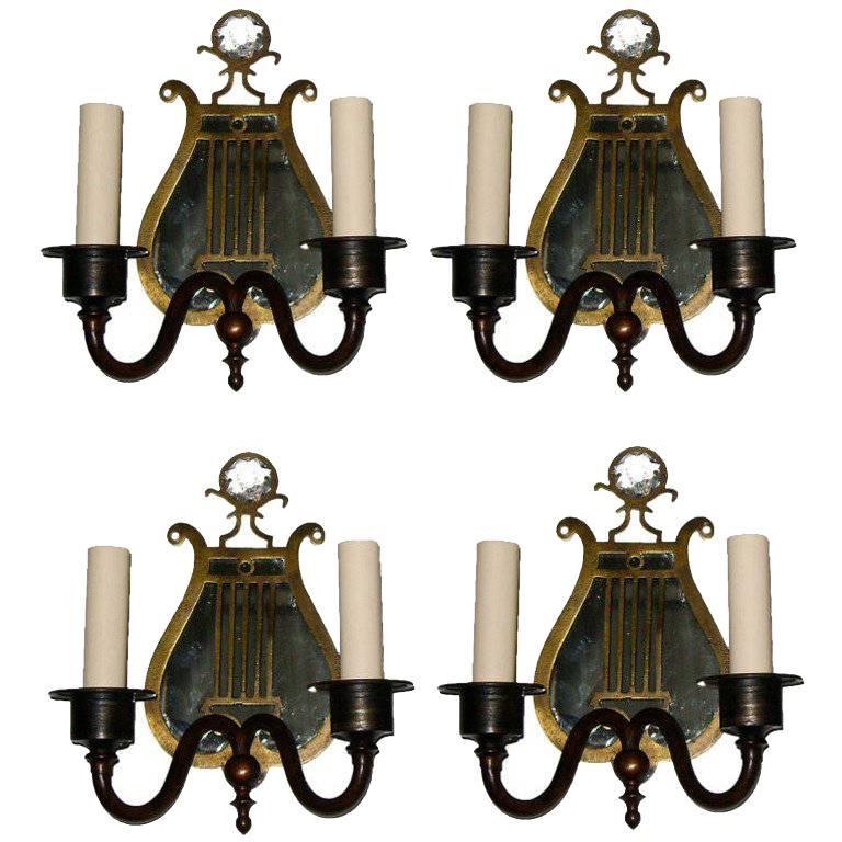 Set of Four Bronze Lyre Neoclassic Sconces. Sold per pair For Sale