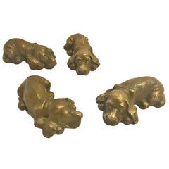 Set of Four Bronze Puppy Dog Paperweights