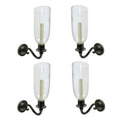 Set of Four Bronze Single Arm Wall Lights with Storm Shades