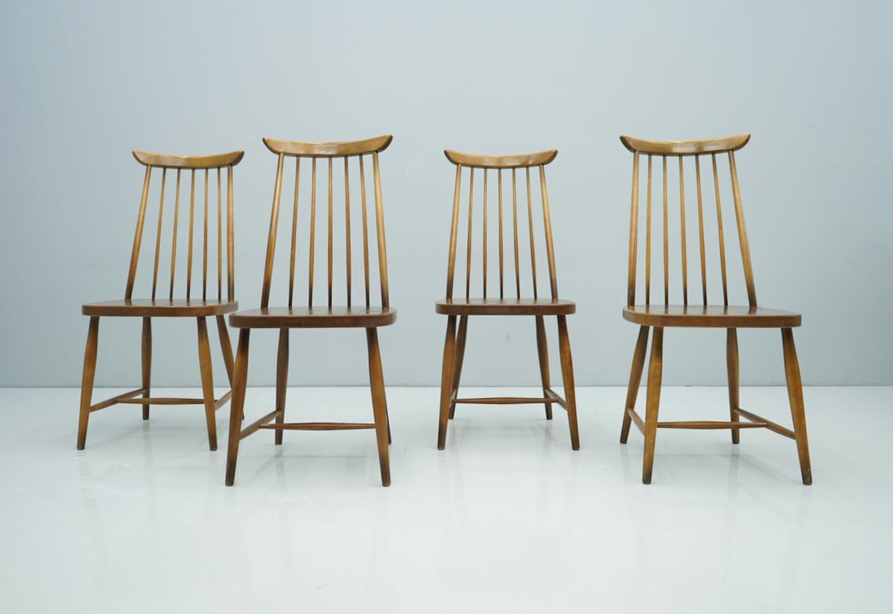 Set of four brown Scandinavian wood dining room chairs, 1960s
Good to very good condition.
