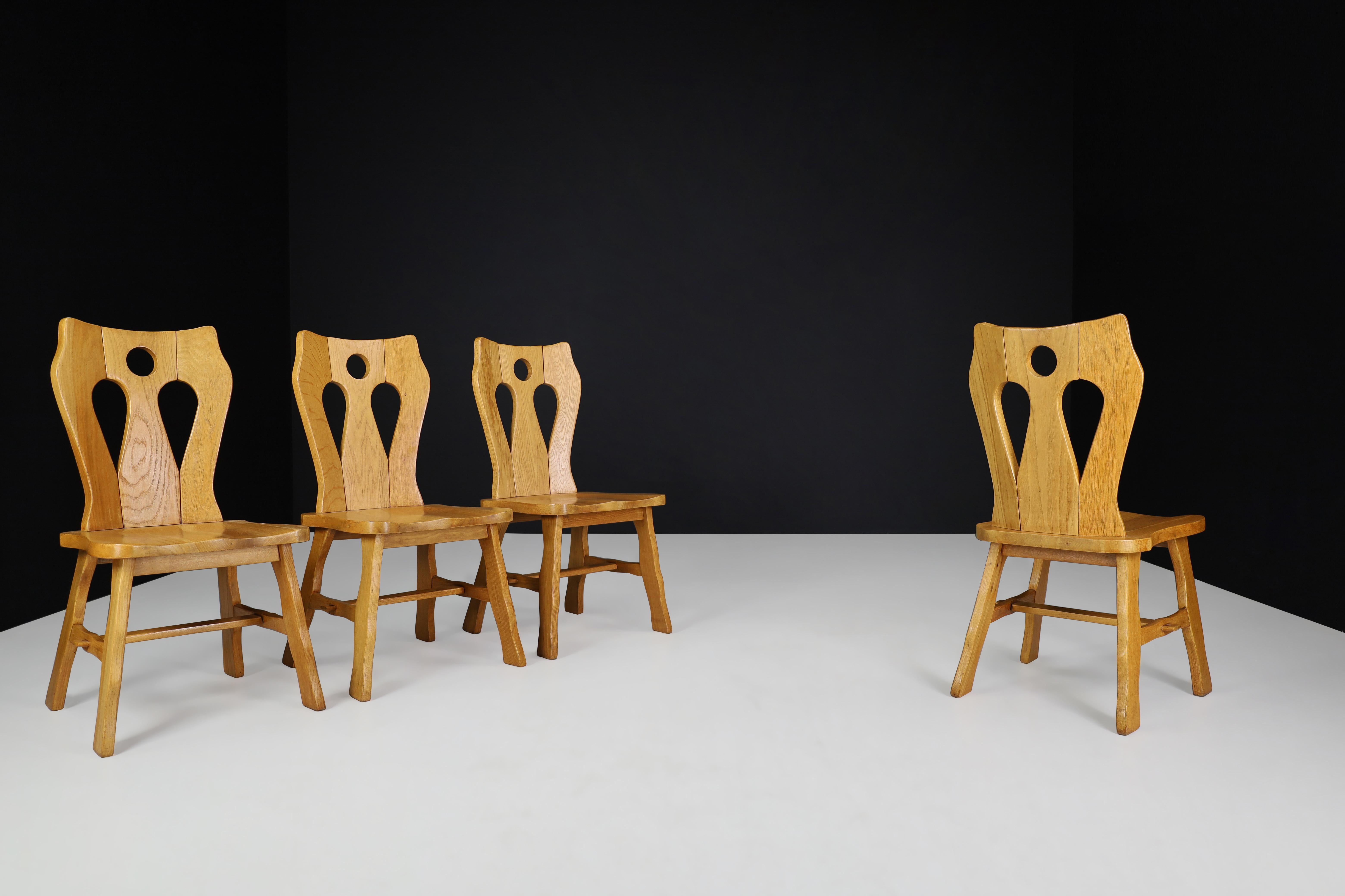 Conjunto de cuatro sillas brutalistas de roble rubio, Bélgica, años 60 Belga en venta