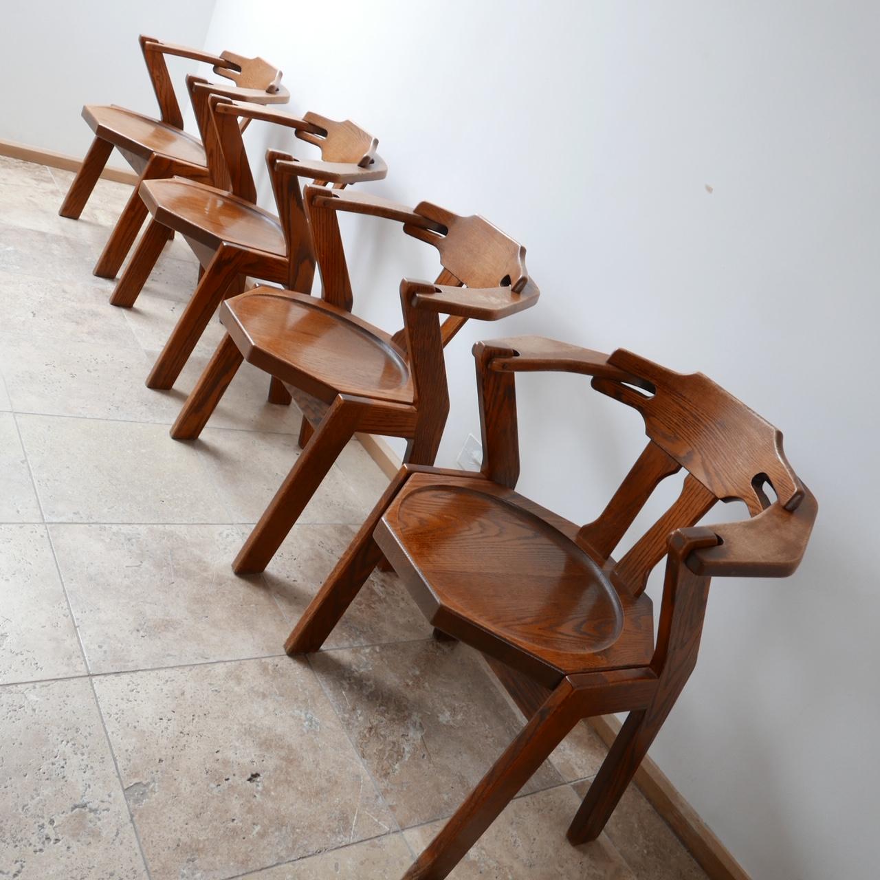 Set of four brutalist mid-century oak dining chairs (4).


A set of four oak dining chairs. 

Brutalist style,

Holland, c1970s. 

Angular lines, good quality. 

Dimensions: 65 W x 48 D x 45 seat height x 82 total height in cm.
  