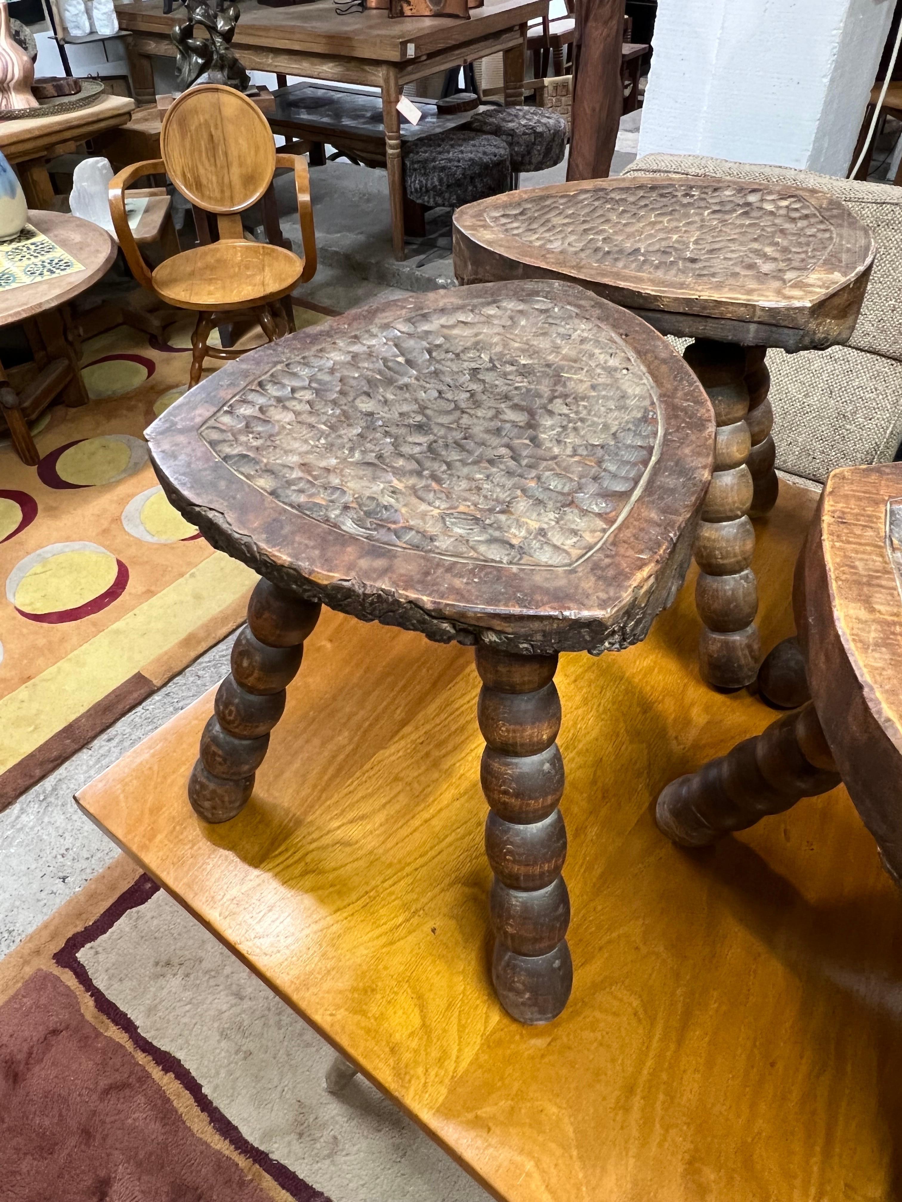 Unusual set of four stools in oak gouge work.