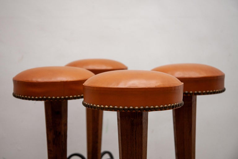 Late 20th Century Set of four Brutalist Stools Wrought Iron, Round Camel Leather Seats For Sale
