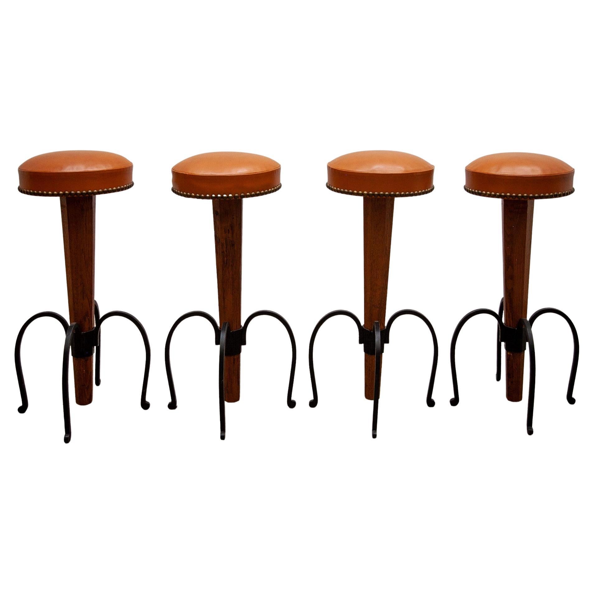 Set of four Brutalist Stools Wrought Iron, Round Camel Leather Seats