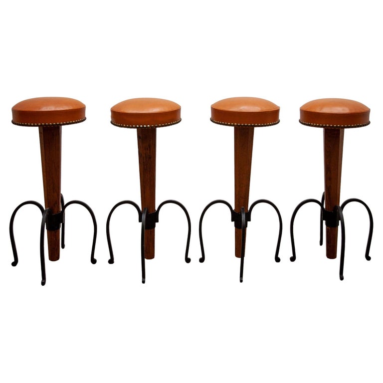 Set of four Brutalist Stools Wrought Iron, Round Camel Leather Seats For Sale