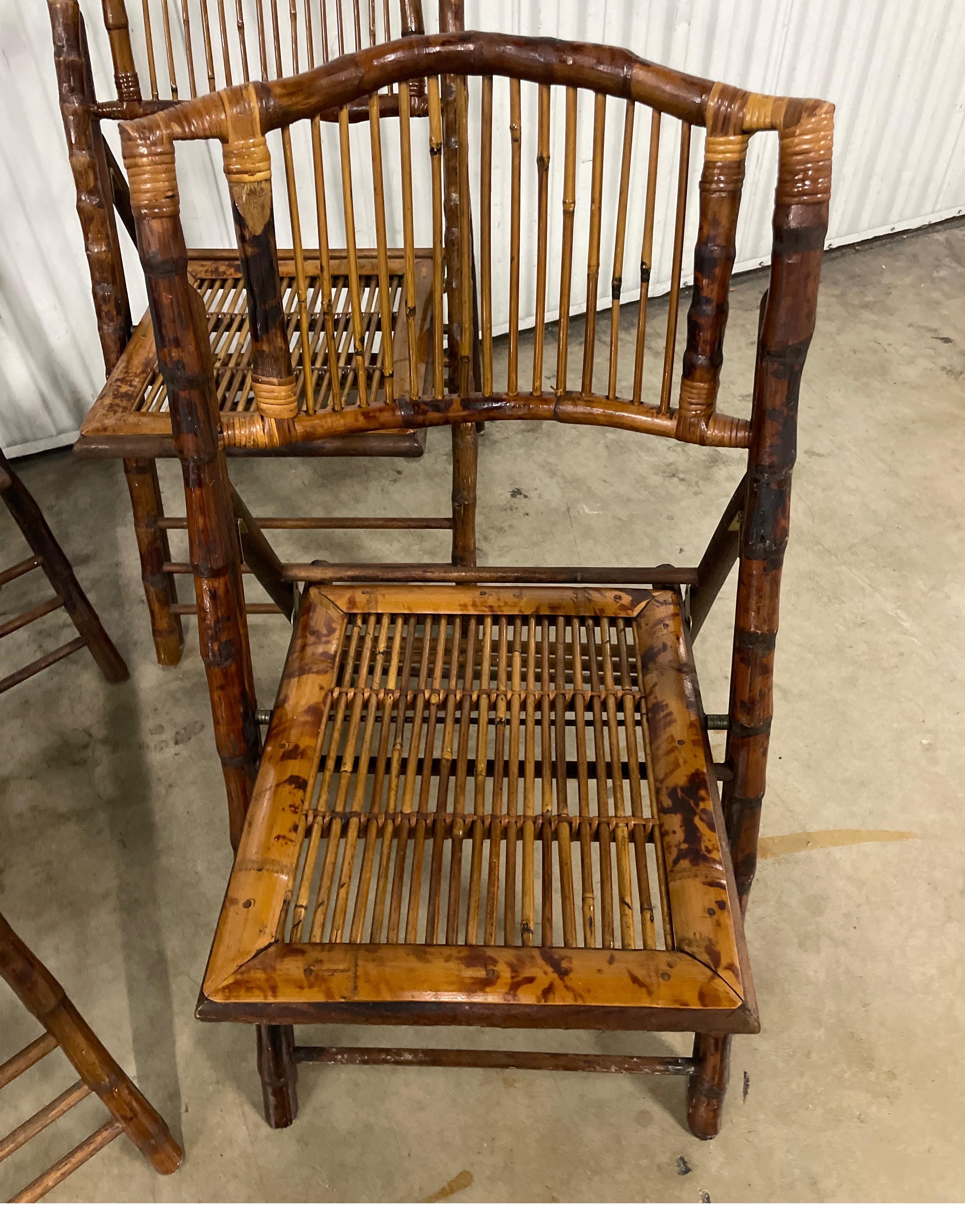 British Colonial Set of Four Burnt Bamboo Tortoise Folding Chairs For Sale