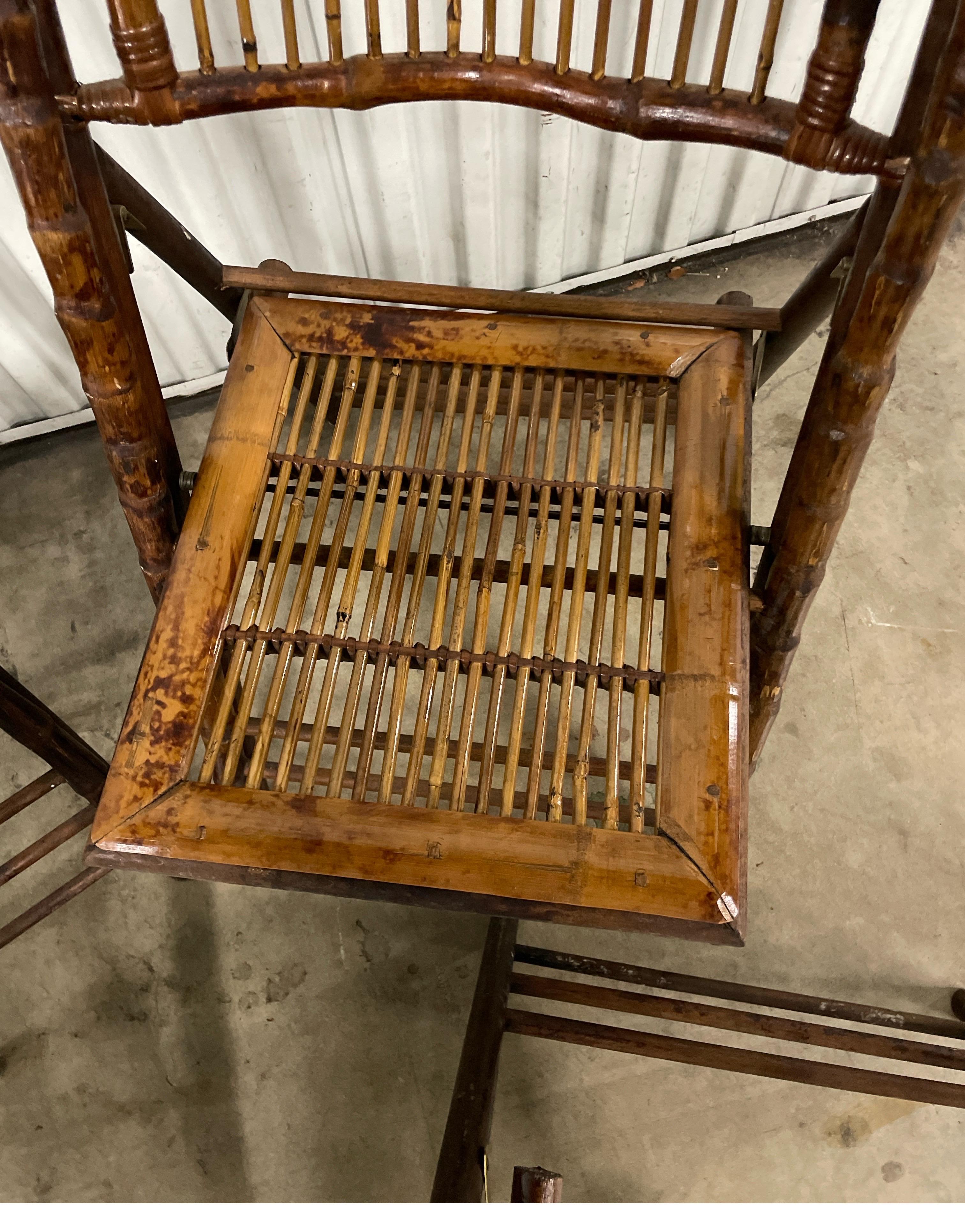 Set of Four Burnt Bamboo Tortoise Folding Chairs In Good Condition For Sale In West Palm Beach, FL
