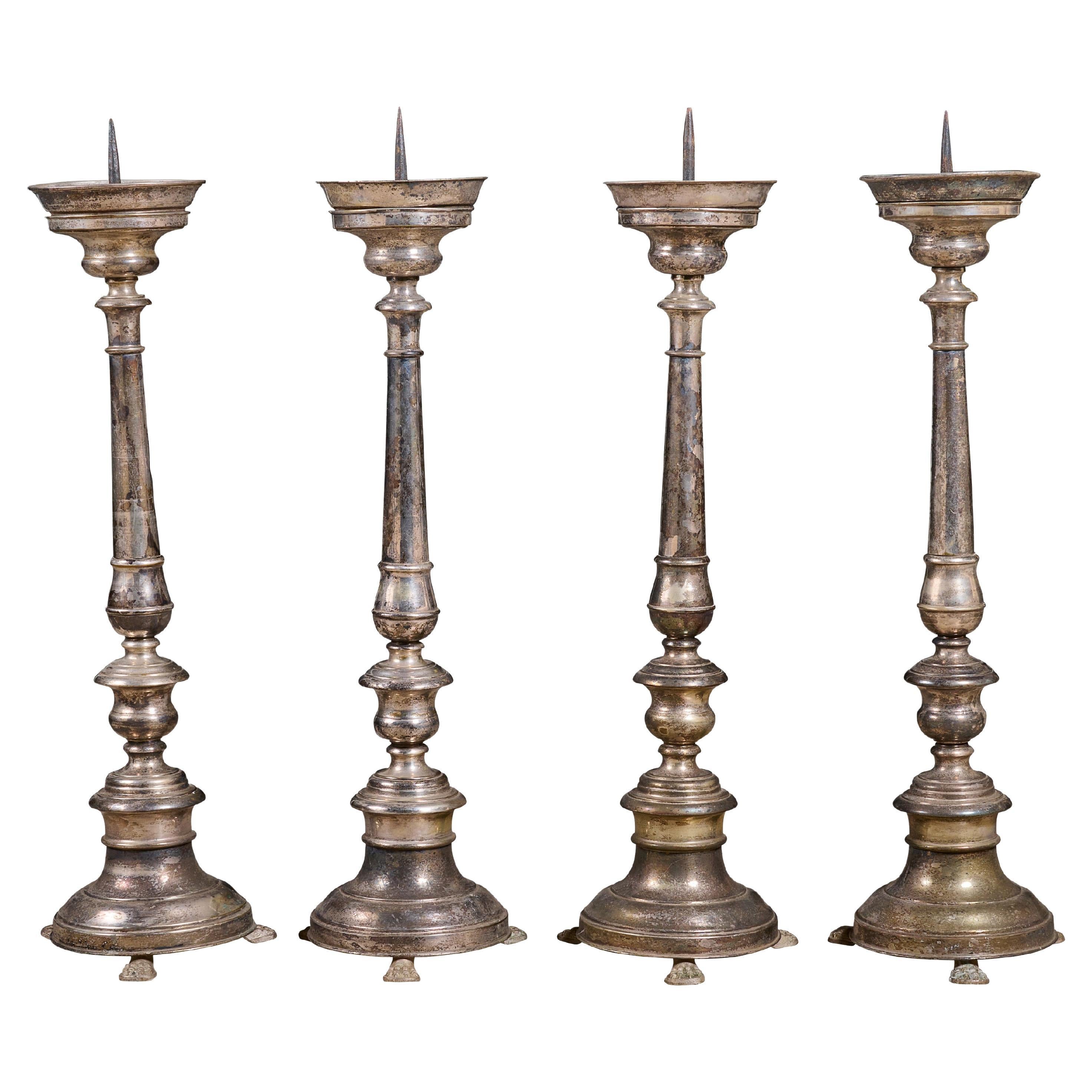 Set of Four Candle Sticks For Sale