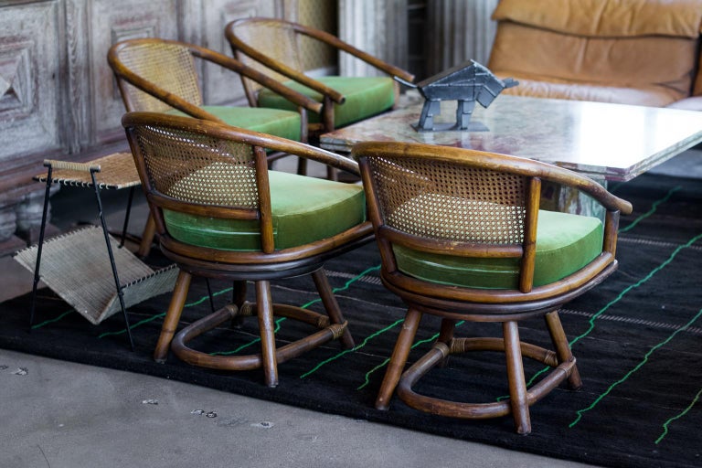 Set of Four Cane and Rattan Swivel Chairs, France, 1960s at 1stDibs