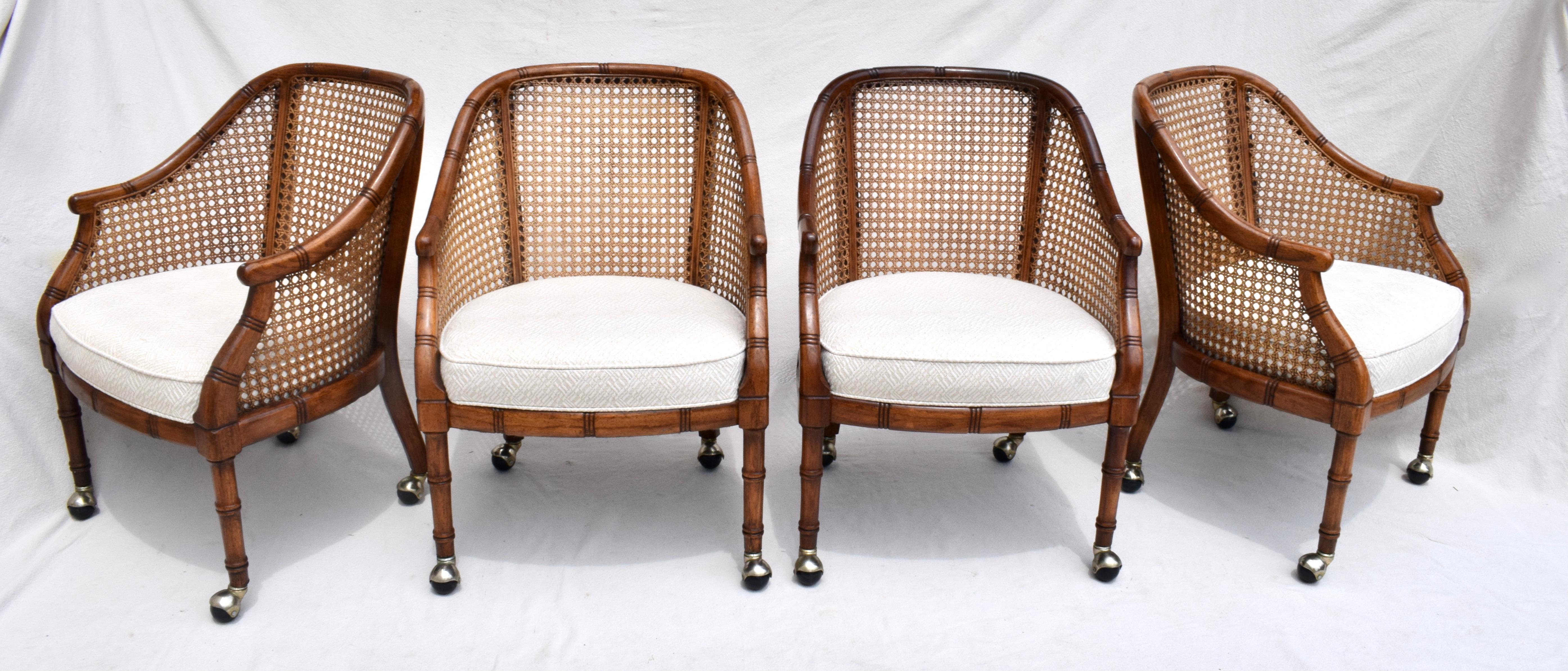 Hollywood Regency Set of Four Caned Barrel Chairs on Casters