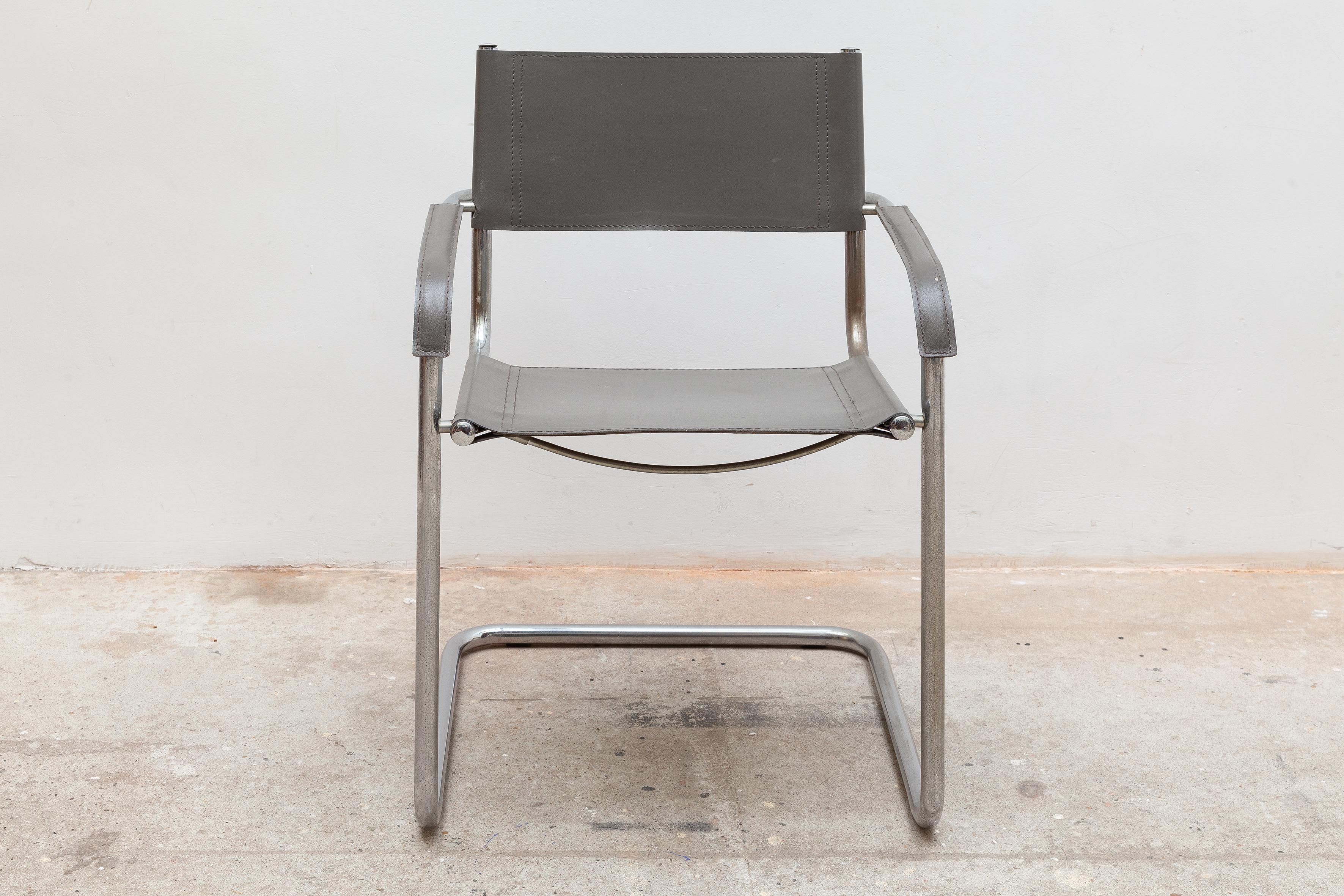 Vintage “S34” model chairs by Thonet. Chromed tubular steel cantilever frame with armrests. Sturdy leather upholstery, seat, backrest and armrest.
Dimensions: 56 W x 80 H x 52 D cm Seat: 47cm high, armrest high 62 cm.