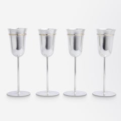 Set of Four Cartier 'Trinity' Sterling Silver Champagne Flutes