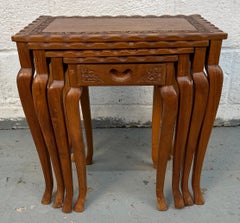 Set of Four Carved Antique Nesting Tables