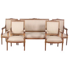 Set of Four Carved and Gilt Louis XVI Style Armchairs