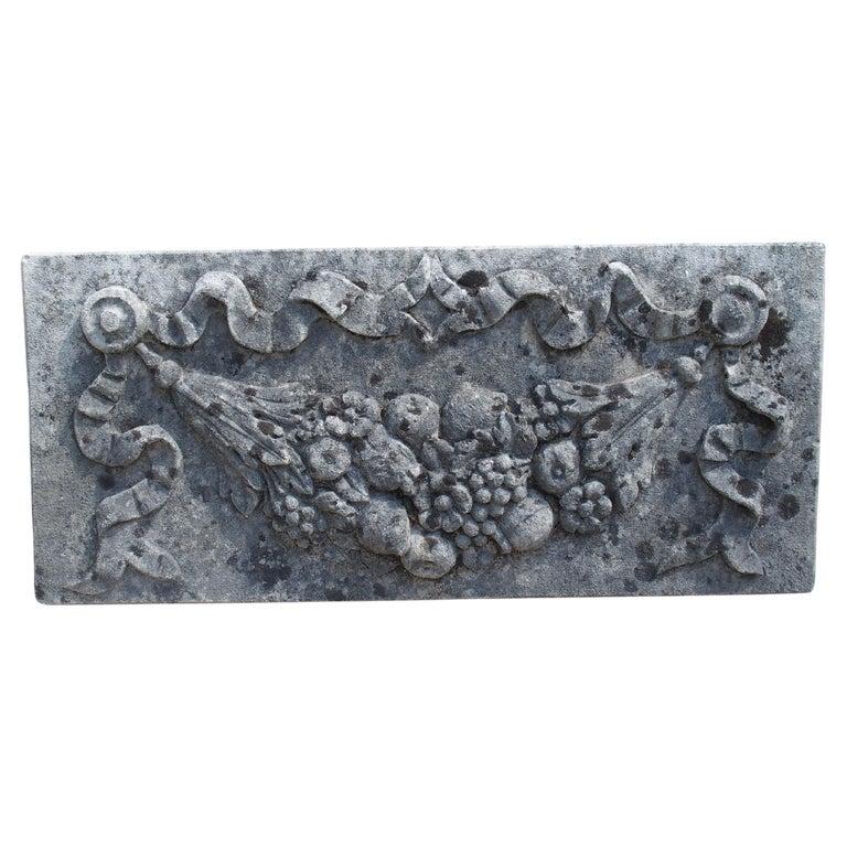 Set of Four Carved Limestone Plaques