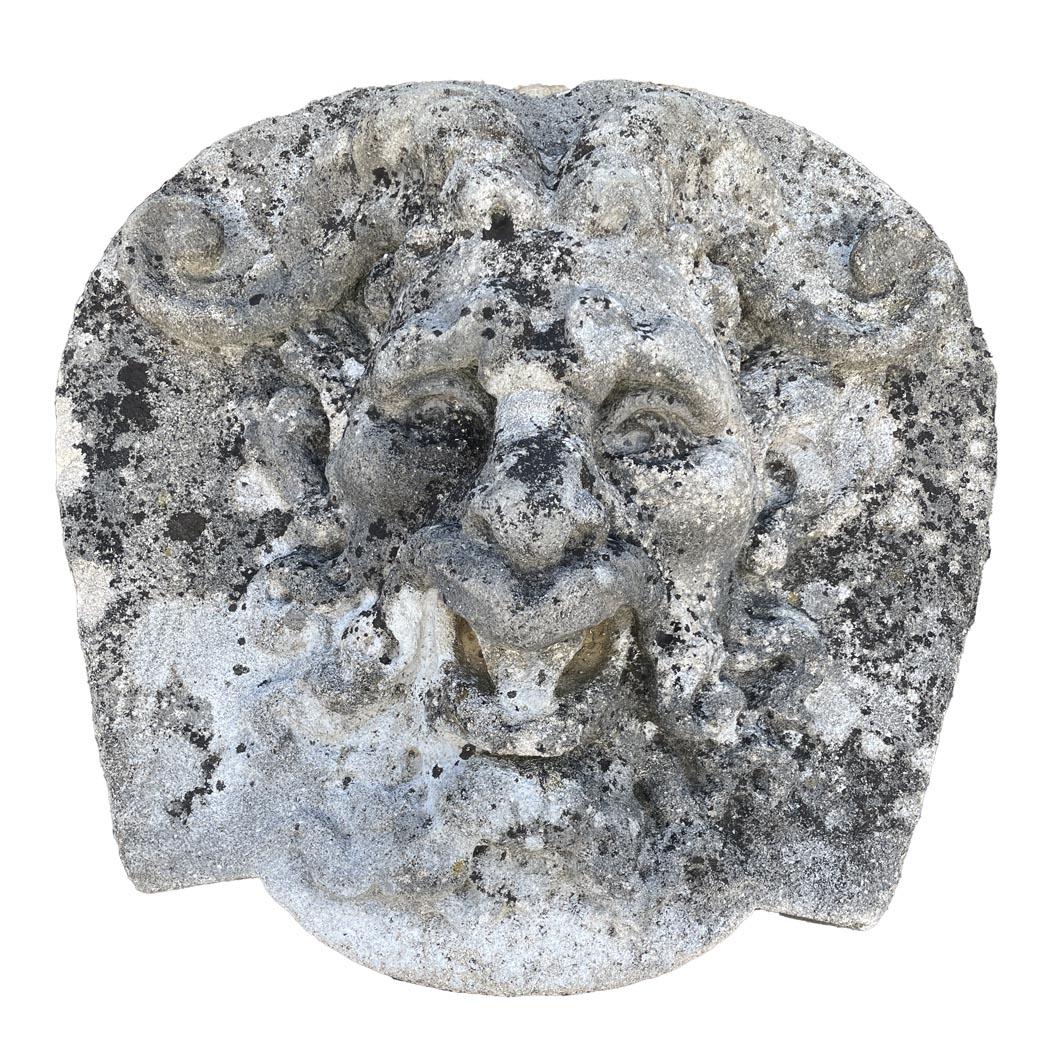 Hand-Carved Set of Four Carved Stone Medallions Depicting Satyr Faces For Sale