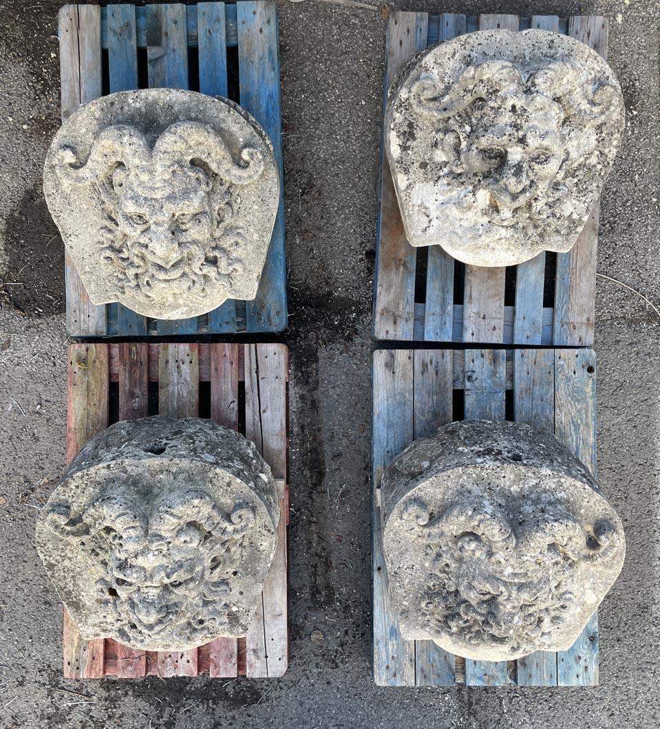 Set of Four Carved Stone Medallions Depicting Satyr Faces In Good Condition For Sale In SAINT-OUEN-SUR-SEINE, FR