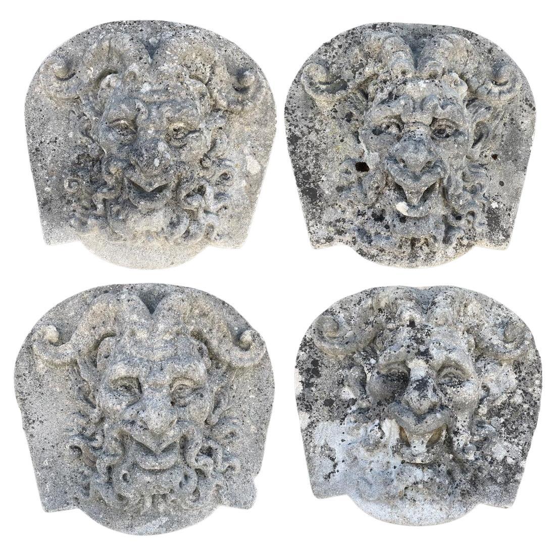 Set of Four Carved Stone Medallions Depicting Satyr Faces For Sale