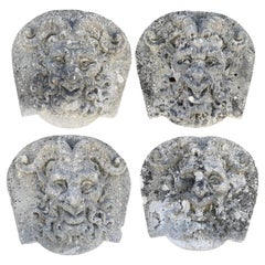 Set of Four Carved Stone Medallions Depicting Satyr Faces