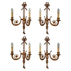 Set of Four Cast Bronze Bows and Tassels Sconces, circa 1900