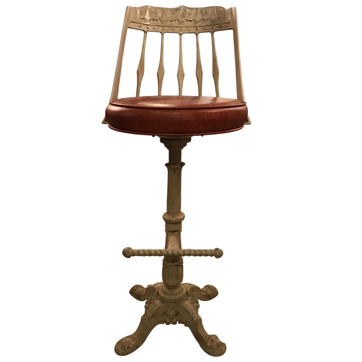 Set of four cast Iron bar stools.
