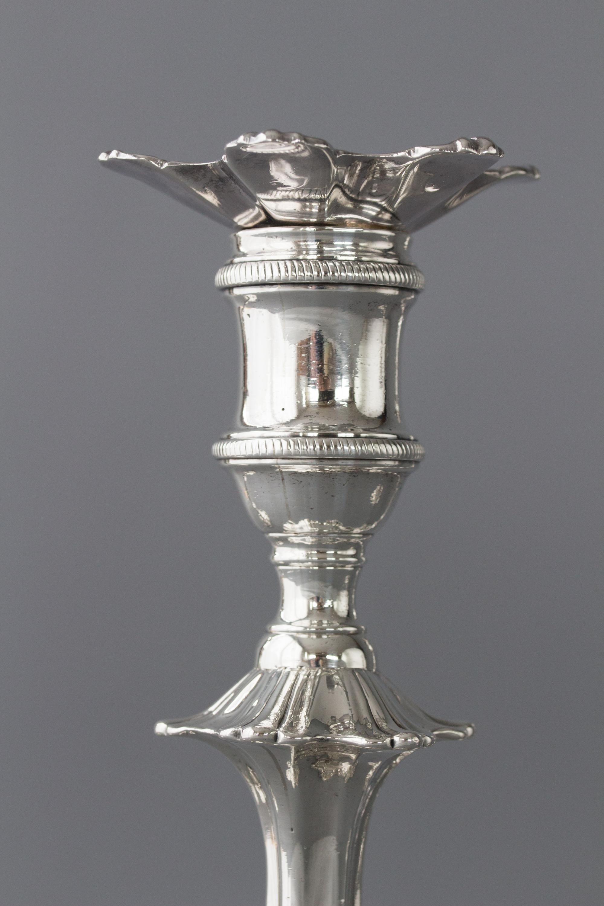 Set of Four Cast Silver Table Candlesticks, London, 1762 3