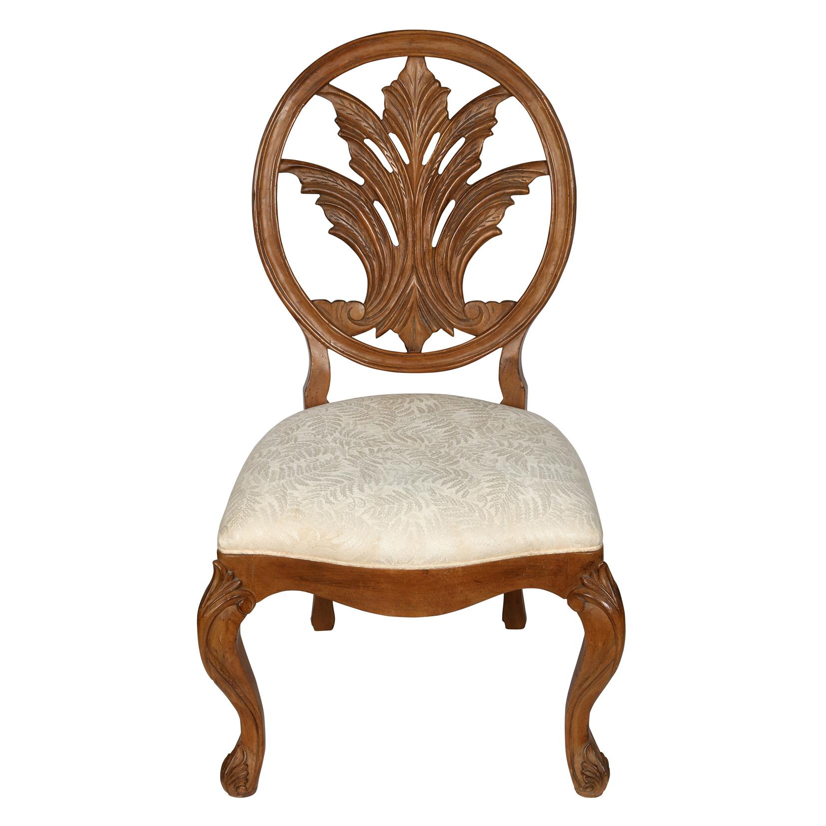 Set of four carved oak palm frond motif side chairs by Century with upholstered seats.