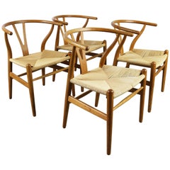 Set of Four CH24 ''Wishbone'' Chairs by Hans J. Wegner Oak Papercord Carl Hansen