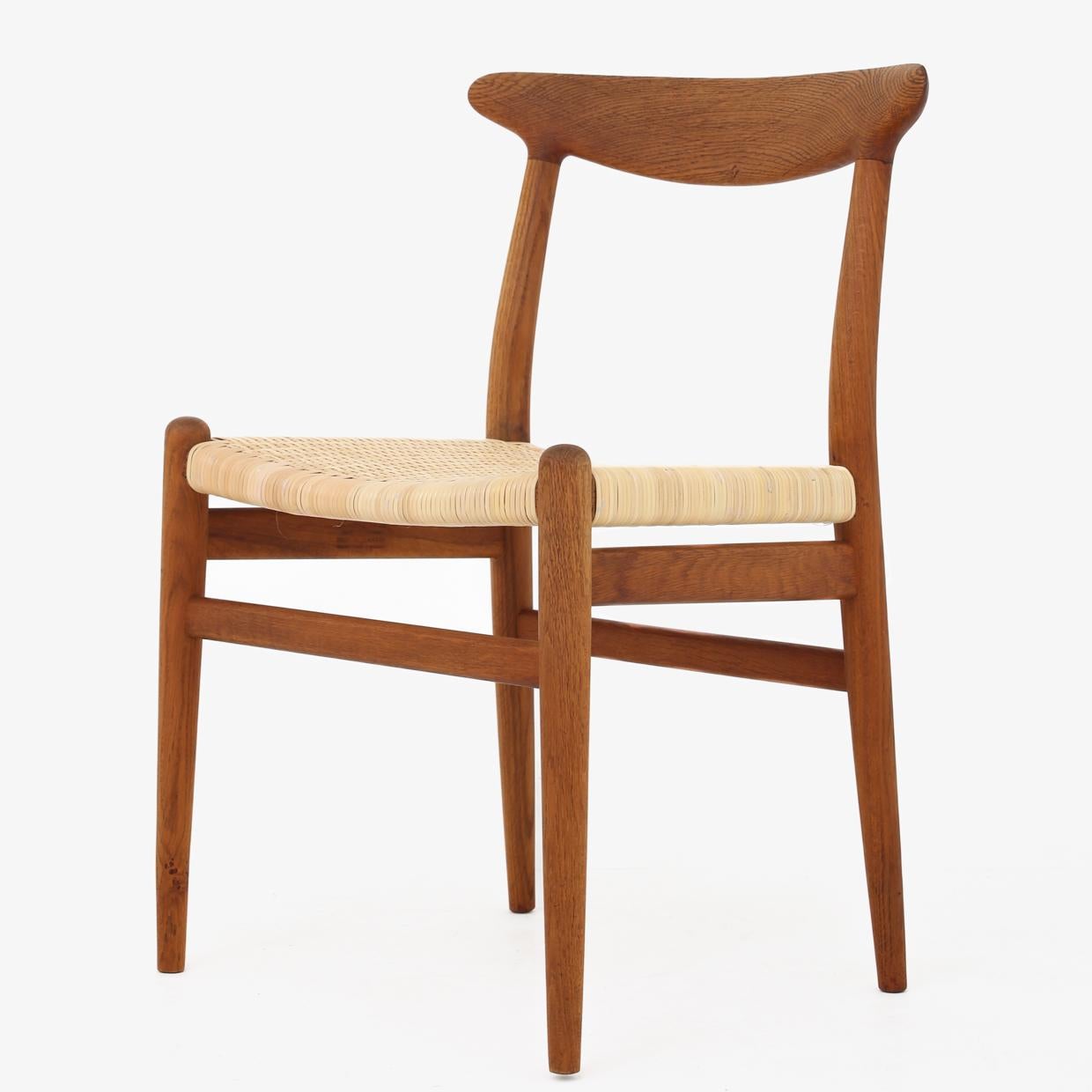 Set of four W2 - Dining chairs in patinated oak and new cane. Hans J. Wegner / C. M. Madsen