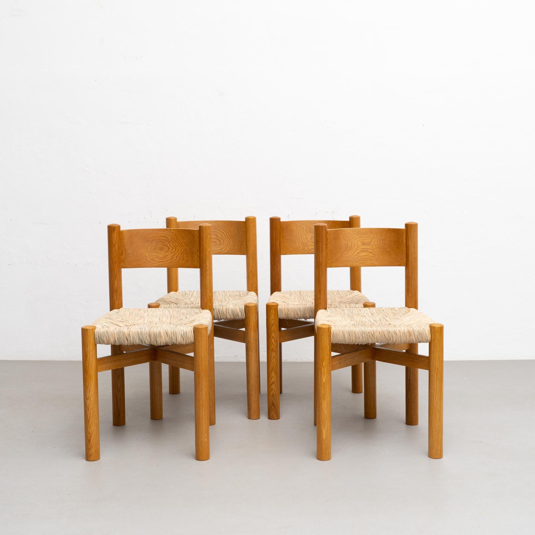 Mid-Century Modern Set of Four Chairs After Charlotte Perriand For Sale