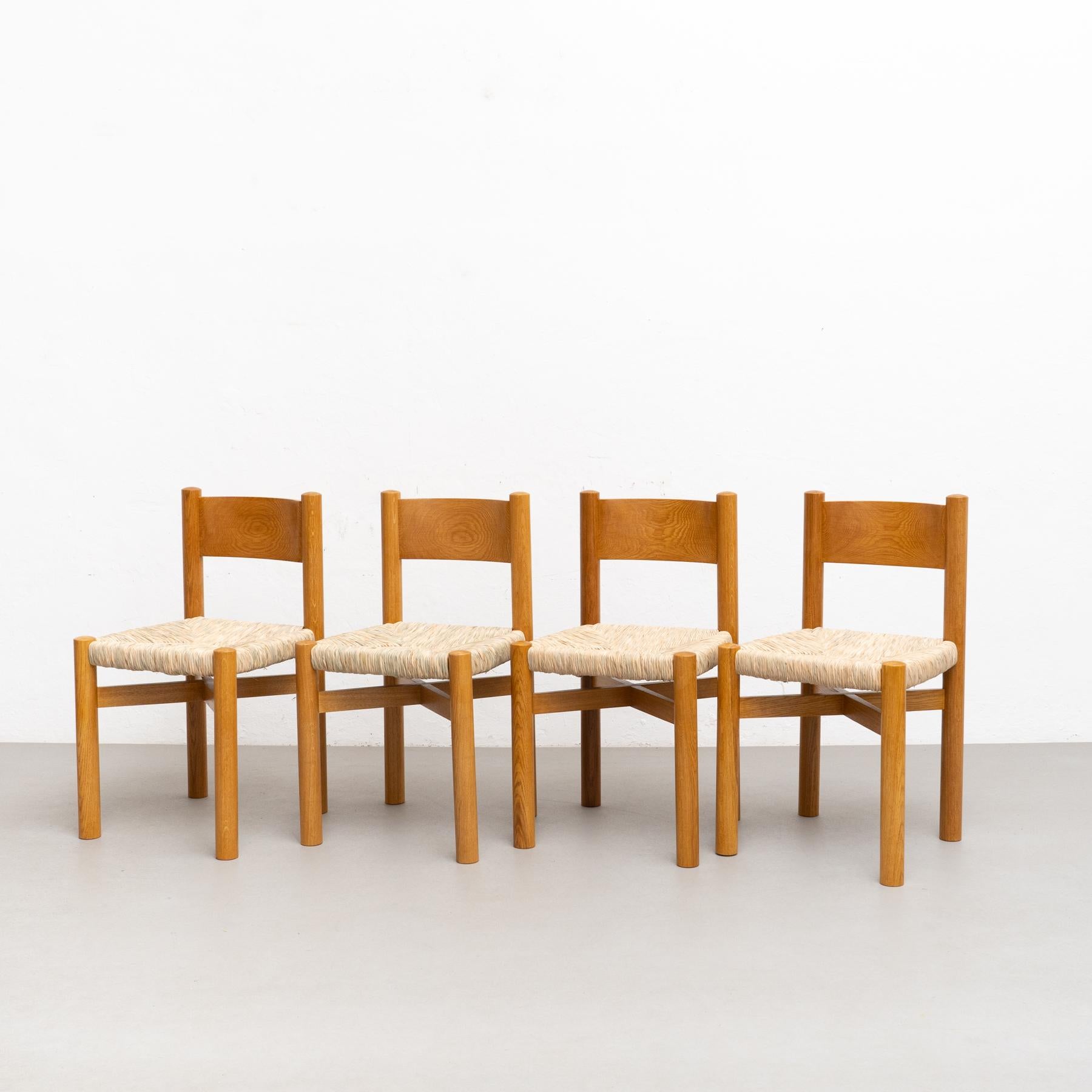 Spanish Set of Four Chairs After Charlotte Perriand For Sale
