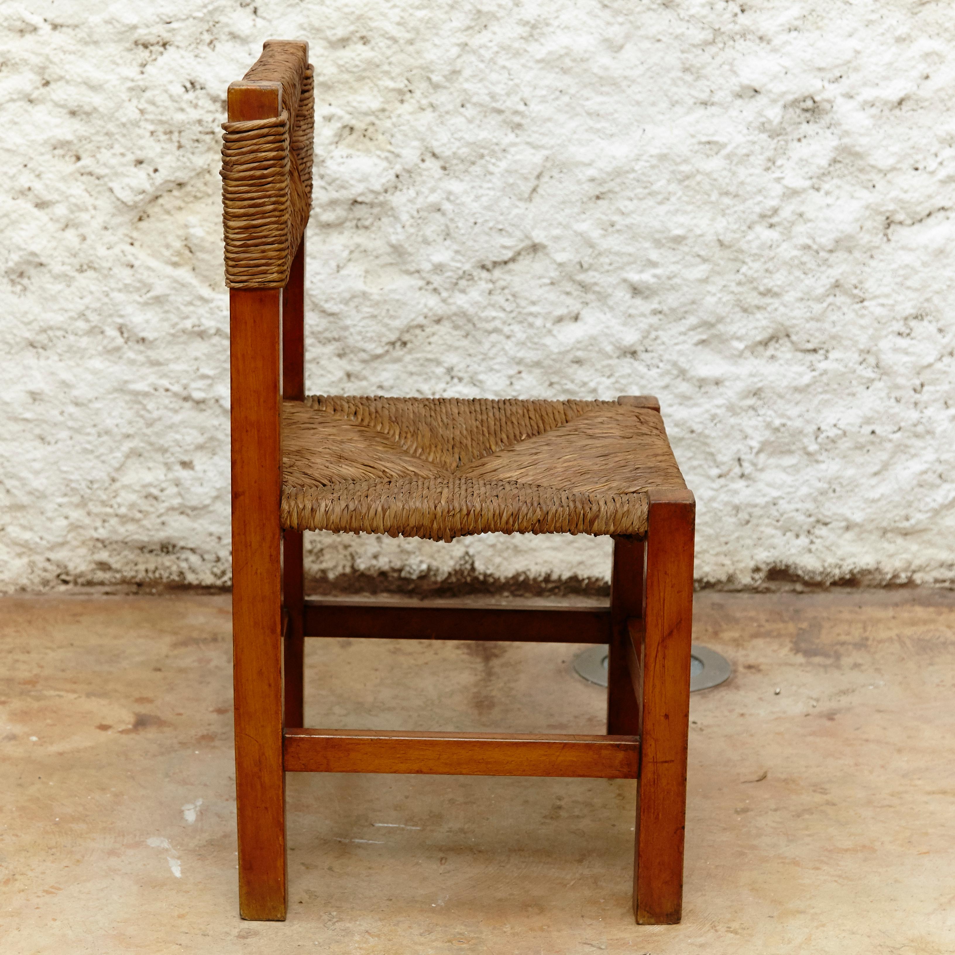 Set of Four Chairs after Charlotte Perriand in Wood and Rattan, circa 1950 9
